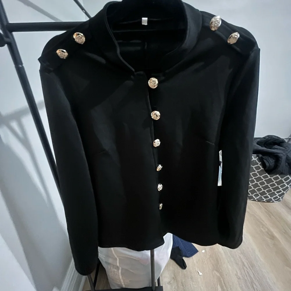Chic Black Jacket with Gold Accents